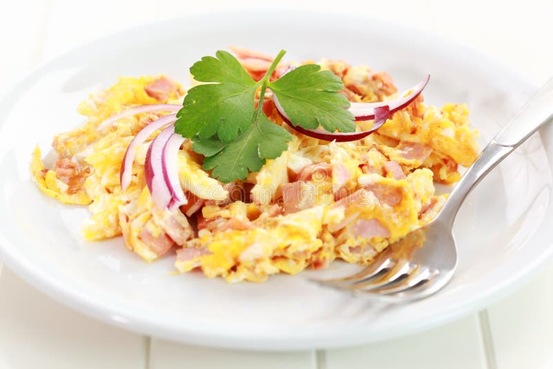 Scrambled eggs with ham royalty free stock images