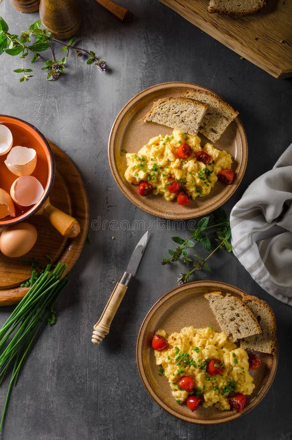 Scrambled eggs with herbs stock photo. Image of rustic 108180832