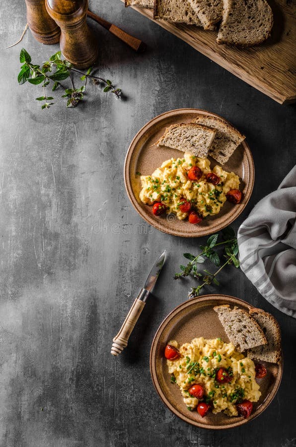 Scrambled eggs with herbs stock image. Image of roasted 113426113