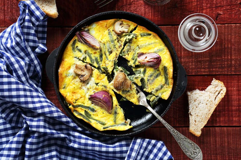 Scrambled Eggs with Mushrooms and Onions in a Pan Stock Photo - Image
