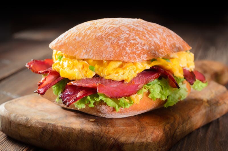Scrambled eggs sandwich stock photo. Image of roasted - 105492056