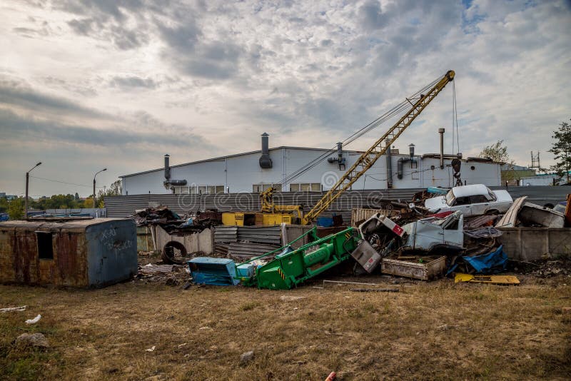 Scrap car recycling yard. Utilizing of old cars