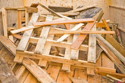 Scrap Wood in a Recycling Skip. Stock Photo - Image of savings, board