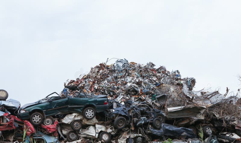 Scrap yard with crushed cars image