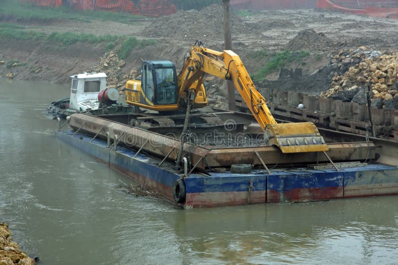 Scraper on a Barge for the Cleaning of the River Bed of the Rive Stock