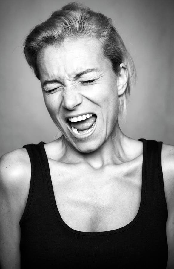 Screaming Expression on the Young Woman`s Face Stock Image Image of