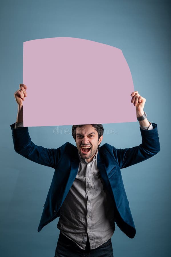 Screaming mad man holding blank poster. People with requirements and demands stock images