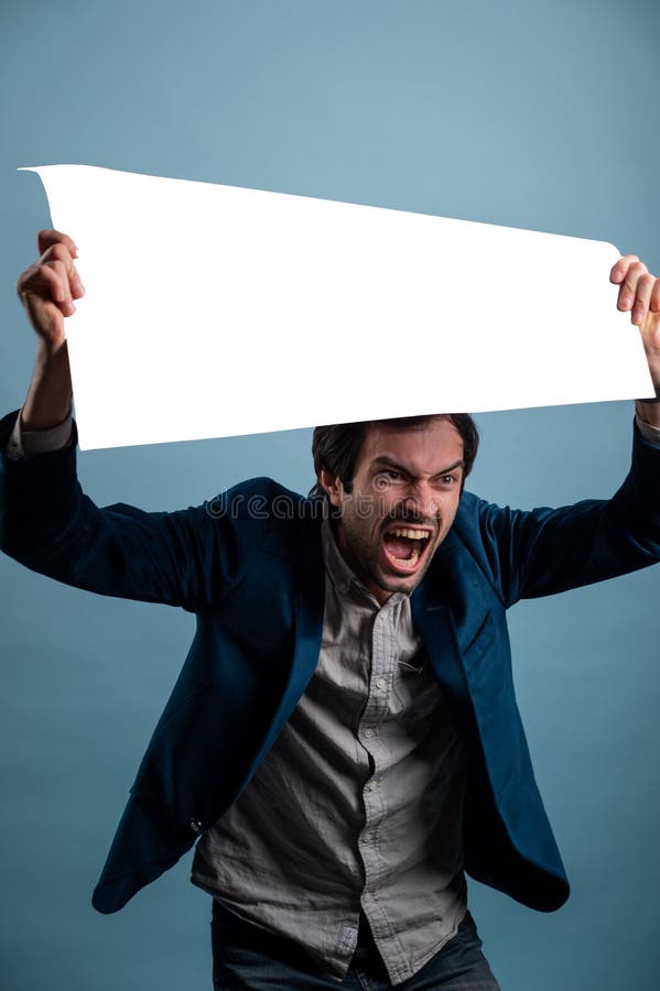 Screaming mad man holding blank poster. People with requirements and demands stock photography