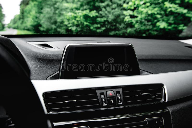 Screen Multimedia System on Dashboard in a Modern Car. Stock Image