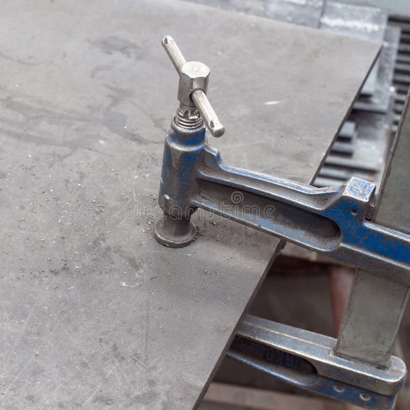 Clamp Pressing On Burning Stack Of Hard Drives Stock Photo Image of