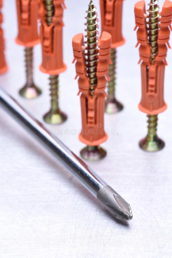 Dowels and metal screws stock image. Image of industry 14965503
