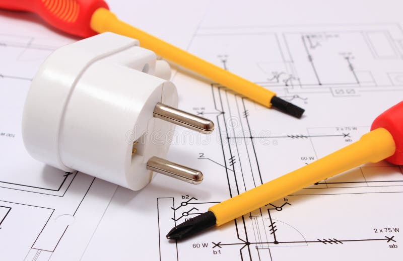 Screwdriver and Electric Plug on Construction Drawing Stock Image