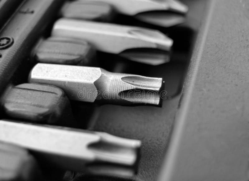 Screwdriver heads in a kit stock photo. Image of steel 34349928