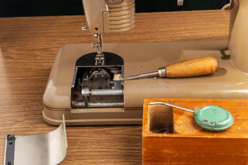 Screwdriver for Repairing a Sewing Machine. Stock Photo Image of