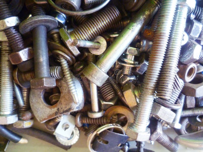 Screws, Bolts, Nuts and Washers Closeup in the Garage Stock Photo