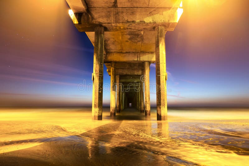 Scripps Pier below UCSD in San Diego after Sunset royalty free stock image Scripps Pier below UCSD in San Diego after Sunset royalty free stock image