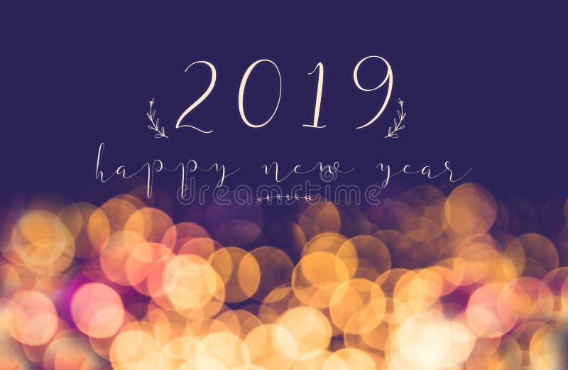 Scrittura 2019 buoni anni sul Li festivo del bokeh della sfuocatura d'annata immagini stock Scrittura 2019 buoni anni sul Li festivo del bokeh della sfuocatura d'annata immagini stock
