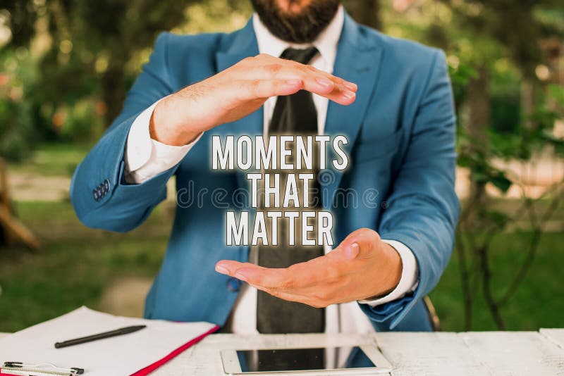 Conceptual hand writing showing Moments That Matter. Concept meaning Meaningful positive happy memorable important times Man in front of table. Mobile phone and notes on the table. Conceptual hand writing showing Moments That Matter. Concept meaning Meaningful positive happy memorable important times Man in front of table. Mobile phone and notes on the table