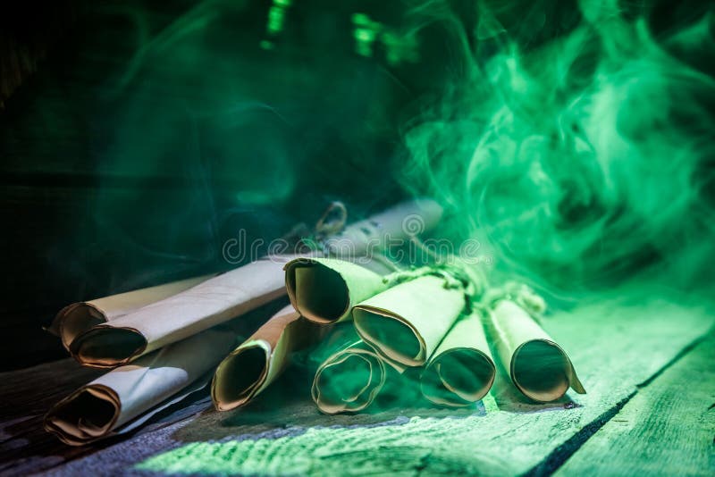 Scrolls and recipe with green light for Halloween