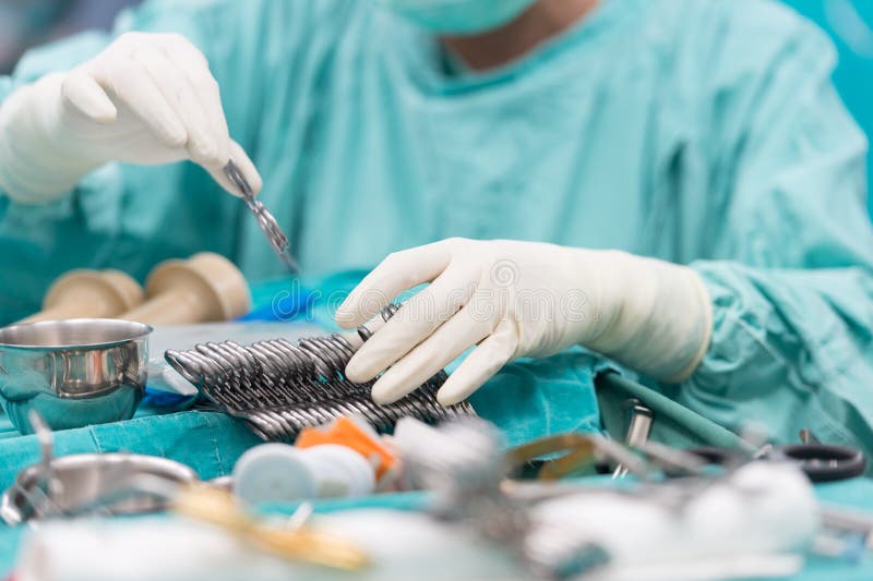 Scrub Nurse Preparing Tools For Open Heart Surgery Stock Photo Image 43678641