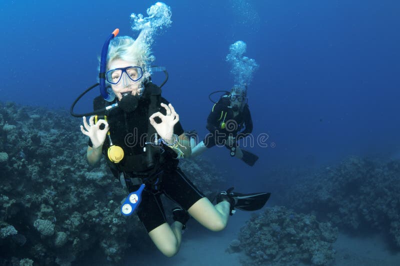 Scuba divers give OK sign