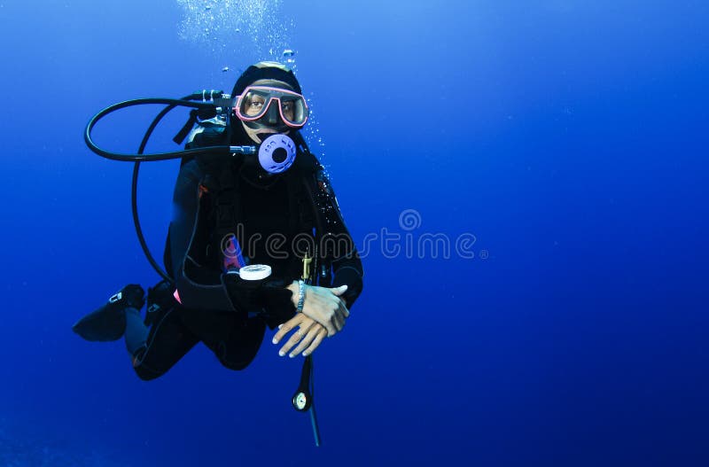 Scuba diving in clear blue water