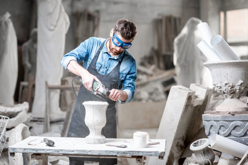 Sculptor Working with Sculptures in the Studio Stock Photo Image of