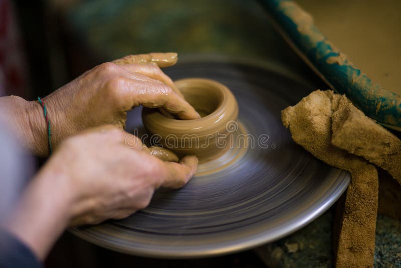 Sculpts In Clay  Pot  Closeup Modeling  Clay  Close up Stock 