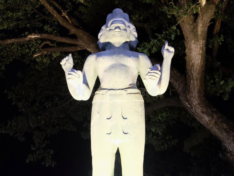 Sculpture of a Four armed Hindu Deity Mythical Creature with Four Sculpture of a Four armed Hindu Deity Mythical Creature with Four