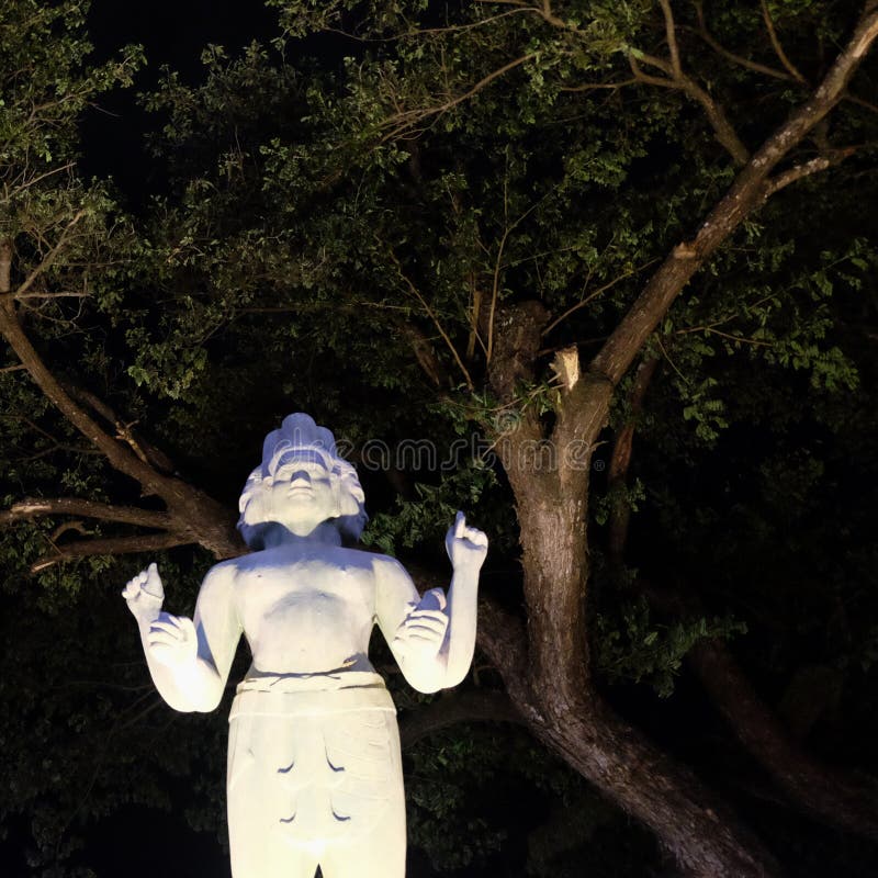 Sculpture of a Four armed Hindu Deity Mythical Creature with Four Sculpture of a Four armed Hindu Deity Mythical Creature with Four