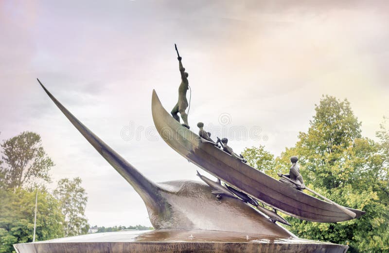 Sculpture of hunters hunting whale in Sandefjord stock photos Sculpture of hunters hunting whale in Sandefjord stock photos