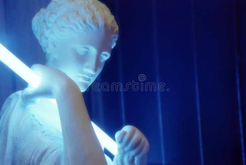 Sculpture with neon light royalty free stock photo