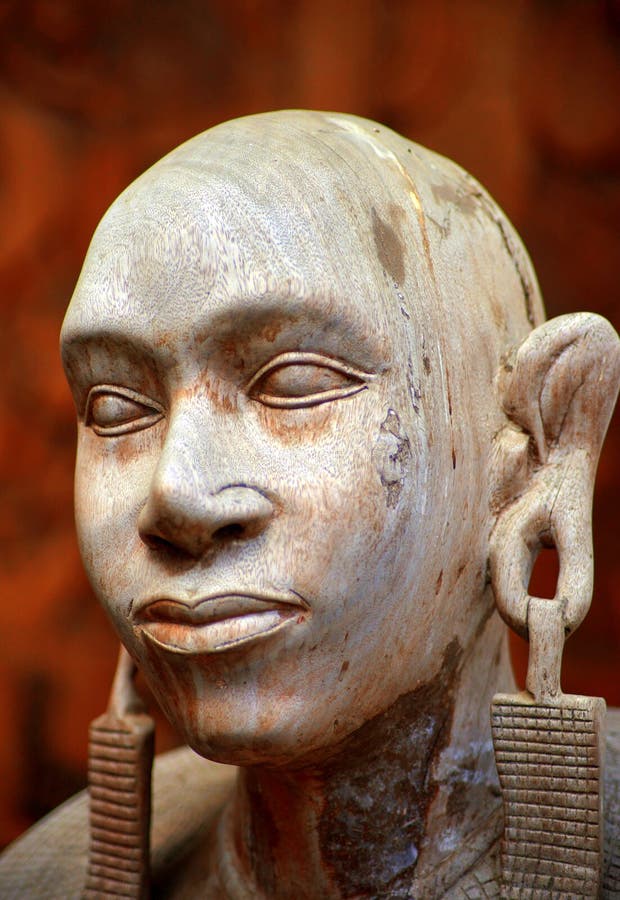 Scultura di una donna africana fotografie stock Scultura di una donna africana fotografie stock