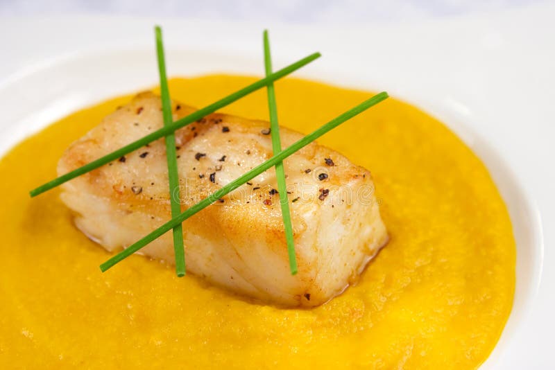 Sea bass with pepper sauce stock image. Image of spiced 5296421