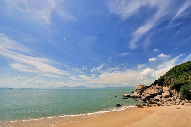 Sea coast with wide sky