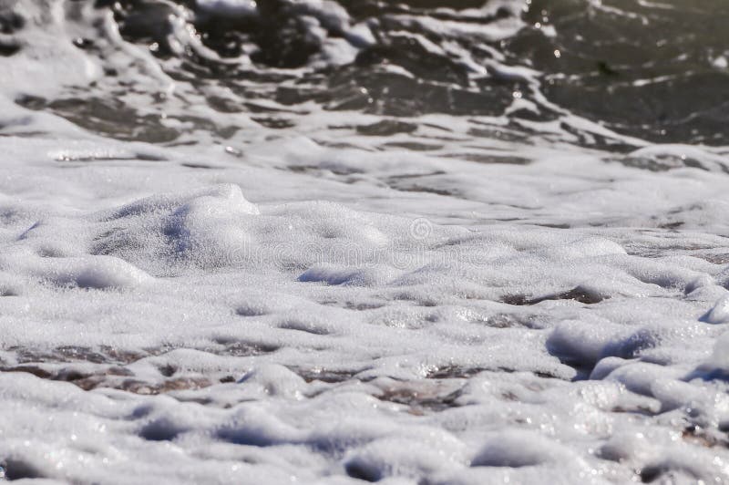 Sea foam. Splashed water stock photos