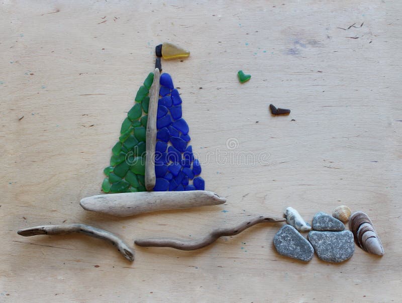 Sea glass, stones, shells and driftwood art project