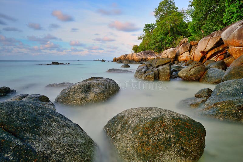 By the sea at Koh Lipe, Satun, Thailand. In the morning, photographing the rocks in the sea Long-exposure photography royalty free stock photo By the sea at Koh Lipe, Satun, Thailand. In the morning, photographing the rocks in the sea Long-exposure photography royalty free stock photo