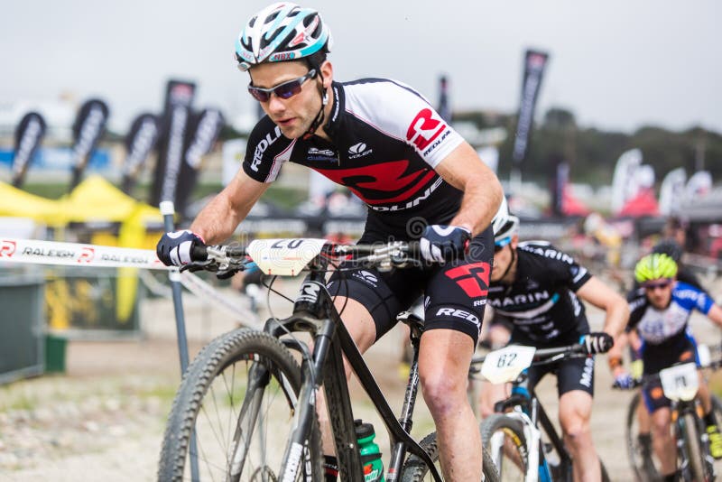 Justine Lindine (Redline Bicycles) races the pro men's Short Track Cross Country racing at the 2014 Sea Otter Classic Bike Festival. Justine Lindine (Redline Bicycles) races the pro men's Short Track Cross Country racing at the 2014 Sea Otter Classic Bike Festival.