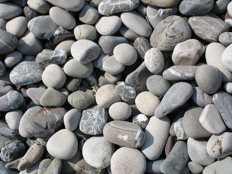 Sea Pebbles stock image. Image of rocky, surf, sunlight 12981785