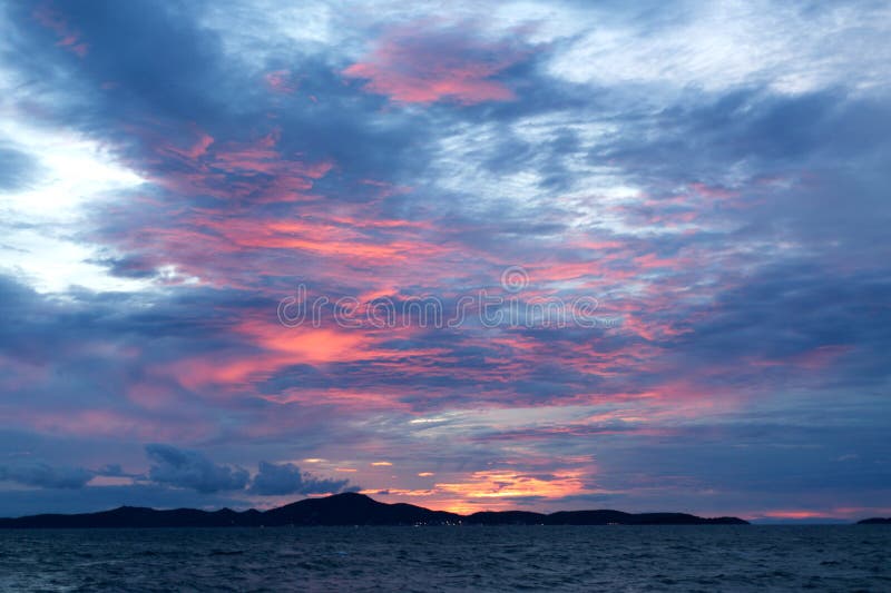 Sea pink sunset. Beautiful color clouds. stock images