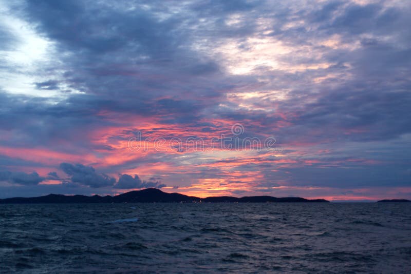 Sea pink sunset. Beautiful color clouds. royalty free stock photography