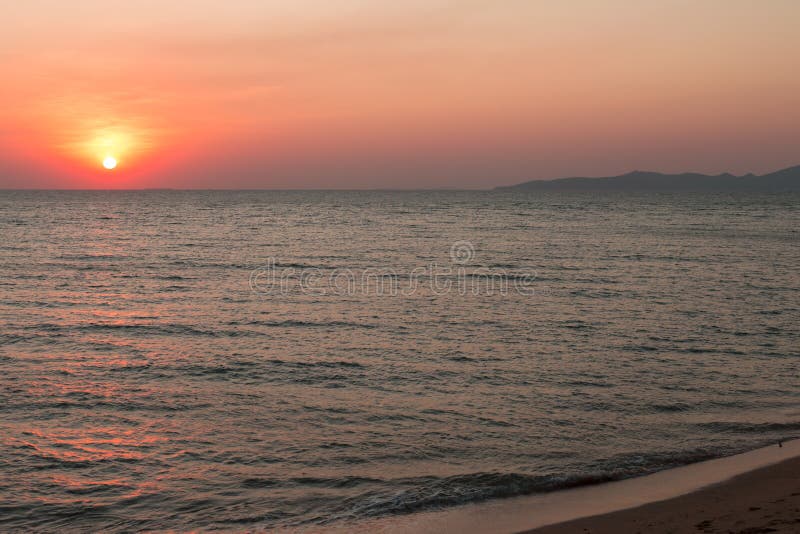Sea pink sunset. Beautiful color clouds. stock photo