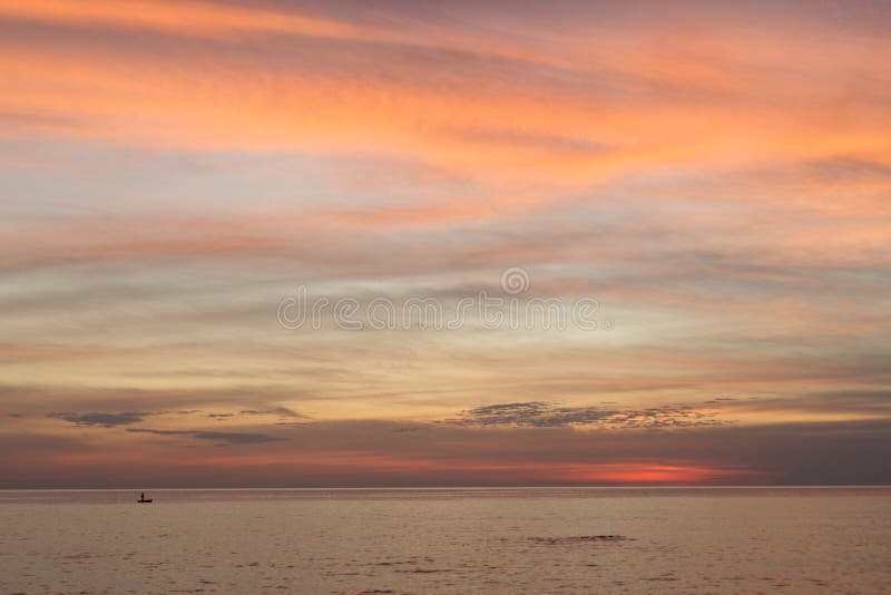 Sea pink sunset. Beautiful color clouds. stock photography