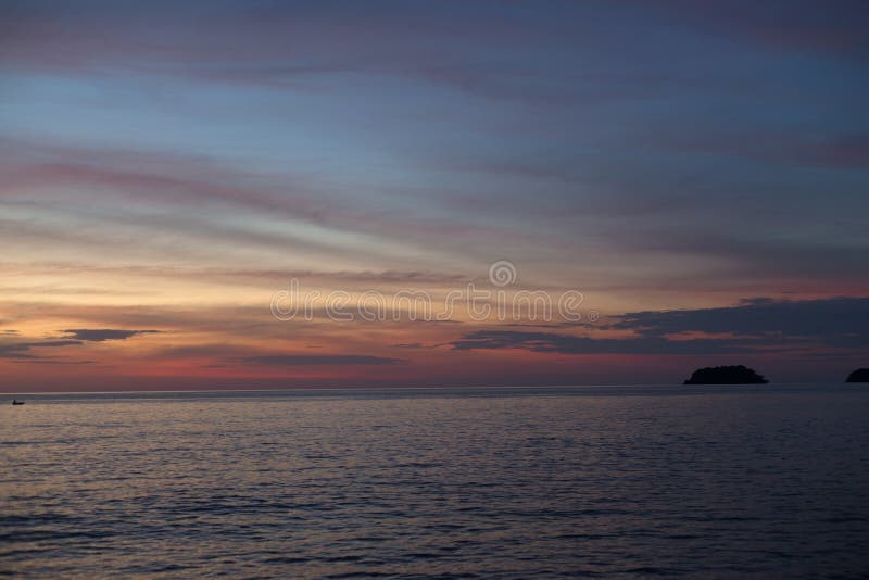 Sea pink sunset. Beautiful color clouds. stock images