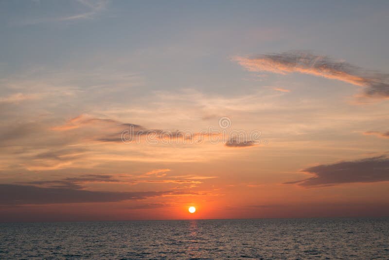 Sea pink sunset. Beautiful color clouds. royalty free stock photography