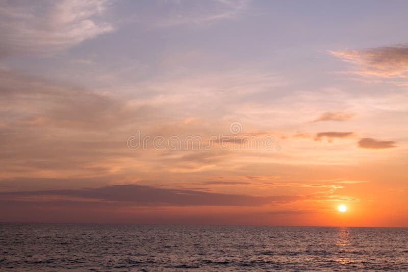 Sea pink sunset. Beautiful color clouds. royalty free stock photo