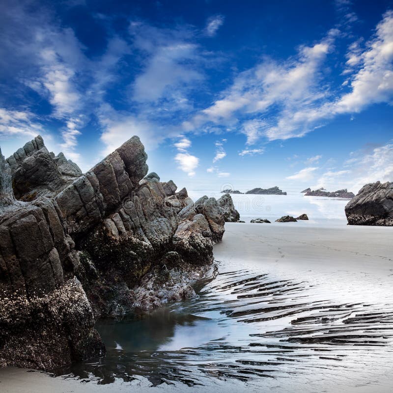 Sea and rock at the sunset. Nature