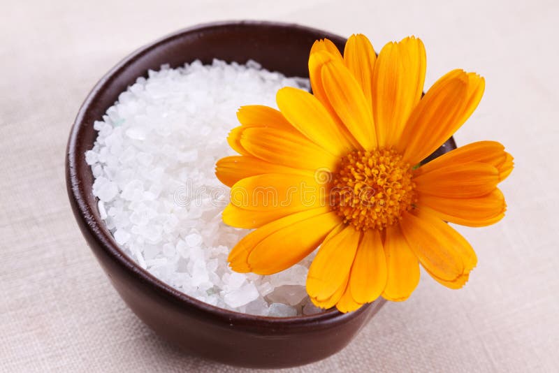 Sea salt with flower marigold