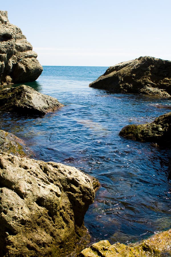 Sea tide between rocks